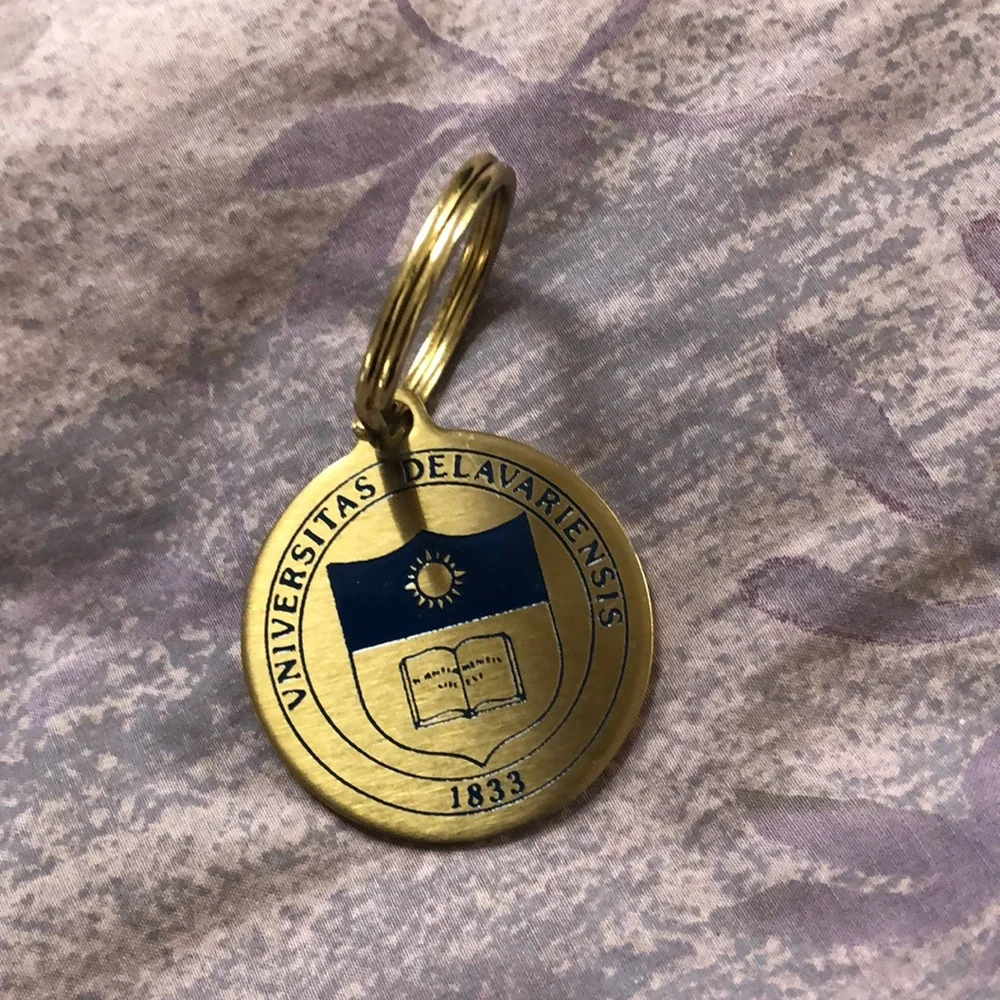 University of Delaware bronze College of Business and Economics keychain. New.